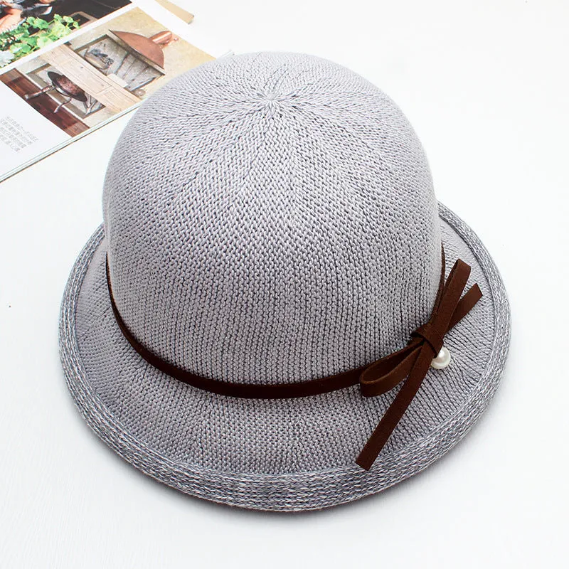 Dome curling pot hat female summer wild Western-style knitted bow pearl sun hat fisherman hat breathable cool hat