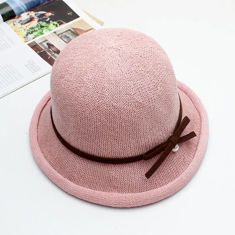 Dome curling pot hat female summer wild Western-style knitted bow pearl sun hat fisherman hat breathable cool hat