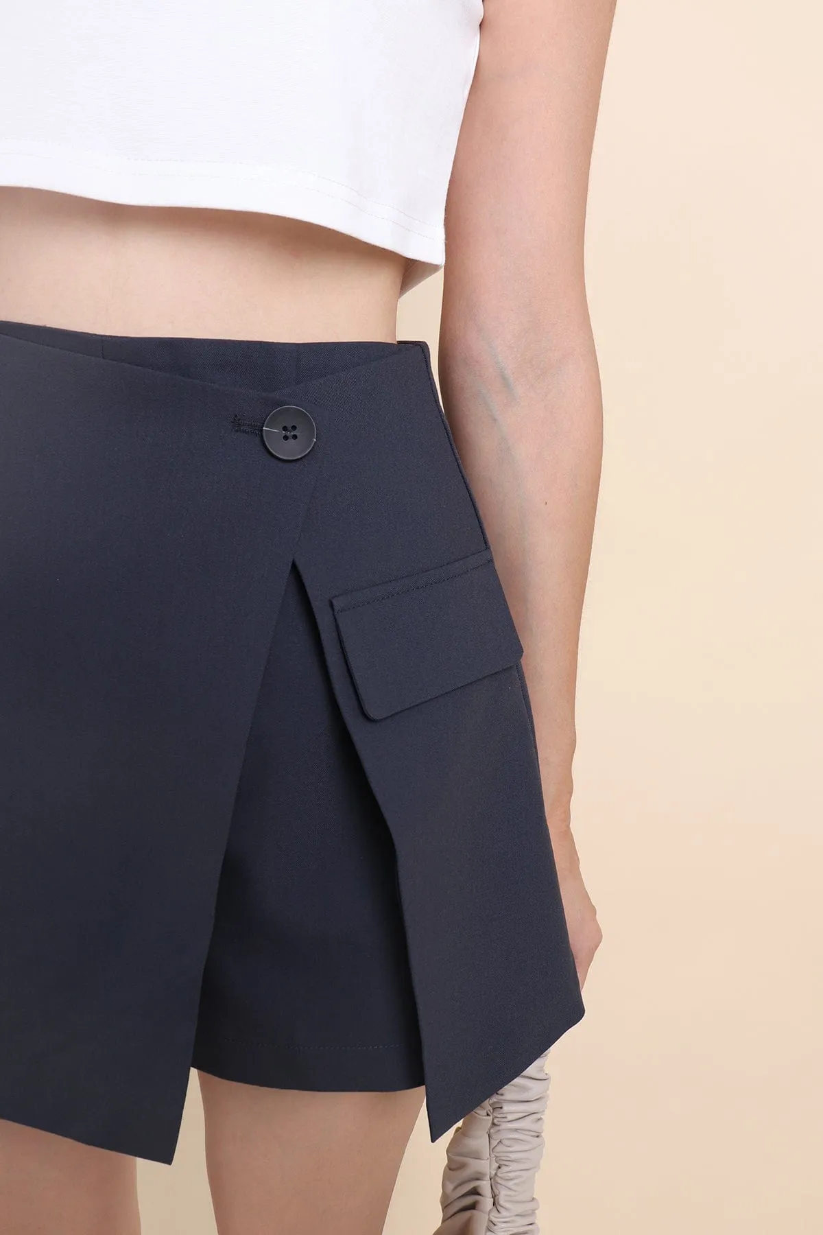 NADEA ASYMMETRICAL SKORTS IN STEEL BLACK